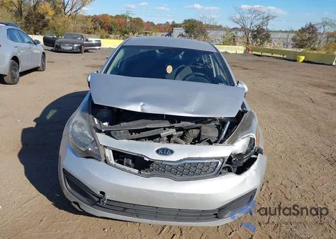 2013 Kia Rio Lx z USA, uszkodzony, nr VIN KNADM4A30D6272845